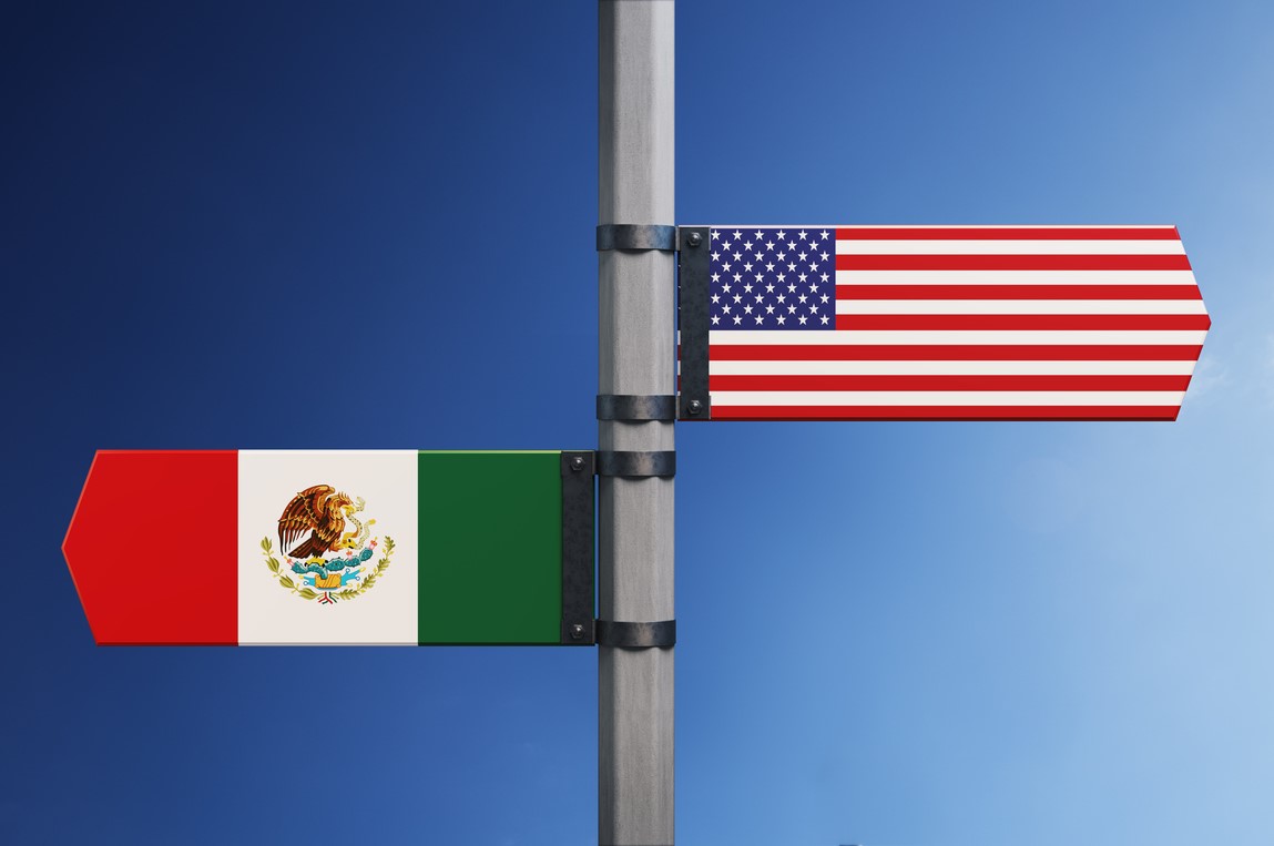 Mexico us signpost flag istock microstockhub 1140388856