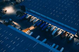 AN AERIAL VIEW OF A WAREHOUSE AT NIGHT 